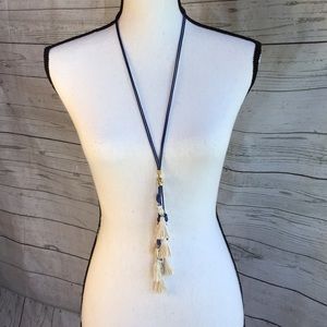 Long blue cord and tassel necklace